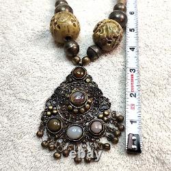 Antique rare ethnic made necklace with carved beads & natural stone set pendant