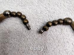 Antique rare ethnic made necklace with carved beads & natural stone set pendant