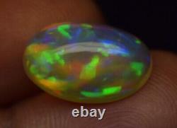 Beautiful Rare Fire 4.40 Carat Natural Ethiopian Oval Opal Cabochon Gemstone