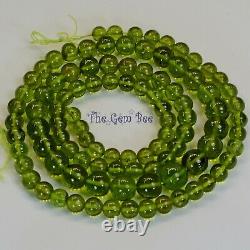 Rare Olive Green Peridot Smooth Round Sphere Globe Beads 23 inch strand
