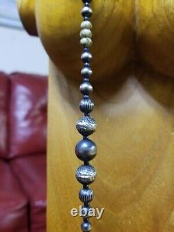 Sterling Silver Navajo Pearl necklace withCrandallite from Utah, Rare. 38long