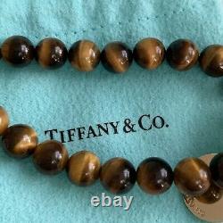 VERY RARE Return to Tiffany & Co. Round Charm 18k Yellow Gold Tiger Eye Bracelet